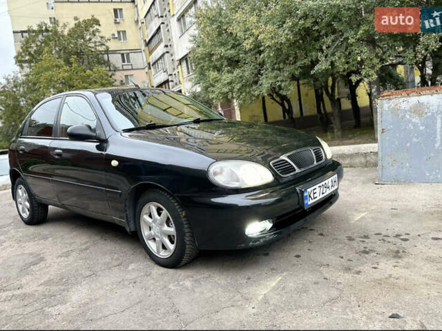 Чорний Деу Ланос, об'ємом двигуна 1.5 л та пробігом 200 тис. км за 1999 $, фото 1 на Automoto.ua