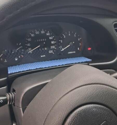 Черный Дэу Ланос, объемом двигателя 1.5 л и пробегом 250 тыс. км за 2300 $, фото 1 на Automoto.ua