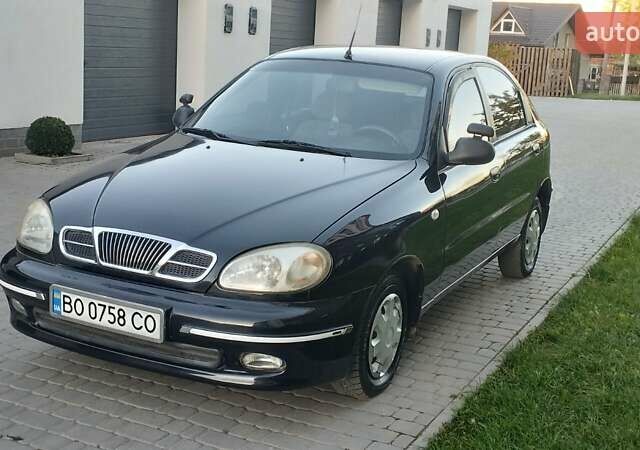 Черный Дэу Ланос, объемом двигателя 1.5 л и пробегом 145 тыс. км за 1950 $, фото 1 на Automoto.ua