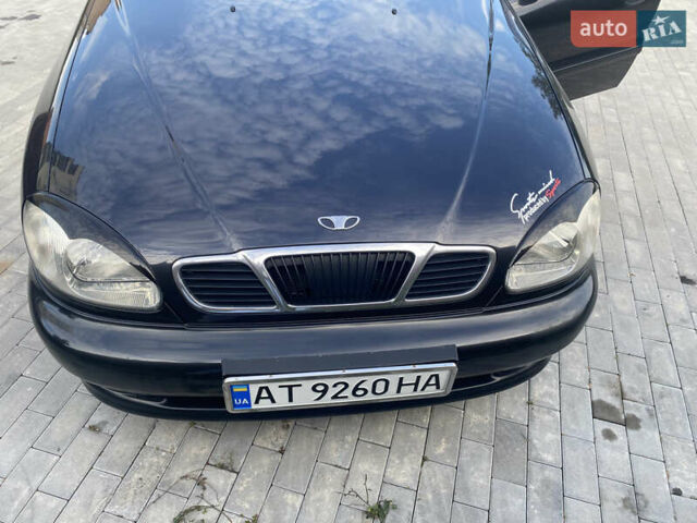 Чорний Деу Ланос, об'ємом двигуна 1.5 л та пробігом 145 тис. км за 2000 $, фото 1 на Automoto.ua