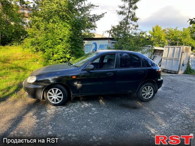 Черный Дэу Ланос, объемом двигателя 1.5 л и пробегом 220 тыс. км за 1850 $, фото 1 на Automoto.ua