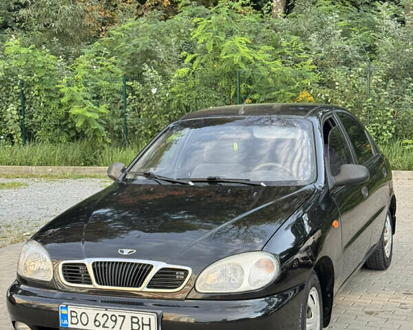 Черный Дэу Ланос, объемом двигателя 1.5 л и пробегом 165 тыс. км за 2700 $, фото 1 на Automoto.ua