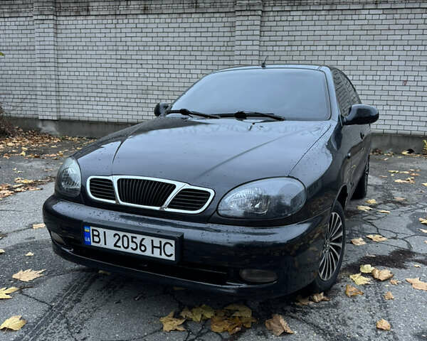 Чорний Деу Ланос, об'ємом двигуна 1.6 л та пробігом 190 тис. км за 2350 $, фото 1 на Automoto.ua