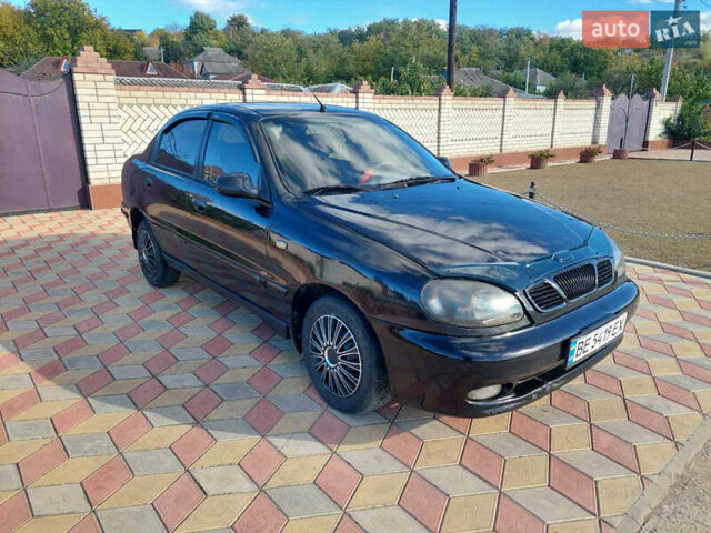 Черный Дэу Ланос, объемом двигателя 1.5 л и пробегом 226 тыс. км за 1450 $, фото 1 на Automoto.ua