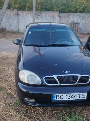 Черный Дэу Ланос, объемом двигателя 1.5 л и пробегом 147 тыс. км за 1800 $, фото 1 на Automoto.ua