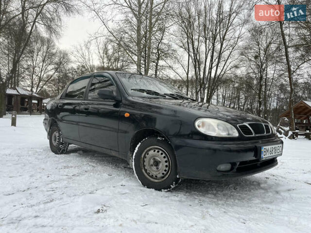 Черный Дэу Ланос, объемом двигателя 1.5 л и пробегом 151 тыс. км за 2900 $, фото 1 на Automoto.ua