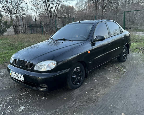Черный Дэу Ланос, объемом двигателя 1.5 л и пробегом 270 тыс. км за 1900 $, фото 1 на Automoto.ua