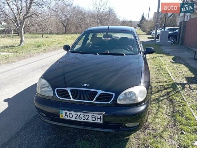 Черный Дэу Ланос, объемом двигателя 1.5 л и пробегом 250 тыс. км за 1750 $, фото 1 на Automoto.ua