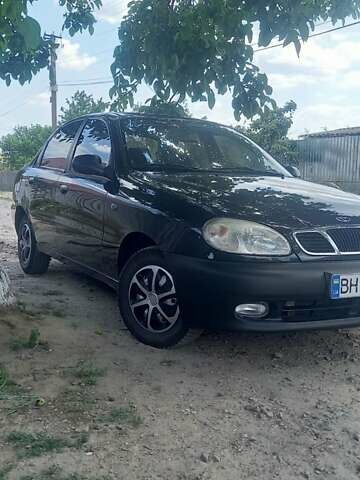 Черный Дэу Ланос, объемом двигателя 1.5 л и пробегом 328 тыс. км за 2700 $, фото 1 на Automoto.ua