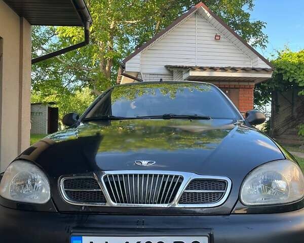 Чорний Деу Ланос, об'ємом двигуна 1.5 л та пробігом 280 тис. км за 1950 $, фото 1 на Automoto.ua