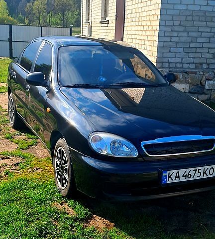Черный Дэу Ланос, объемом двигателя 1.5 л и пробегом 170 тыс. км за 2050 $, фото 1 на Automoto.ua