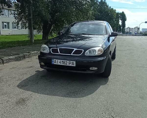 Черный Дэу Ланос, объемом двигателя 1.5 л и пробегом 202 тыс. км за 3250 $, фото 1 на Automoto.ua