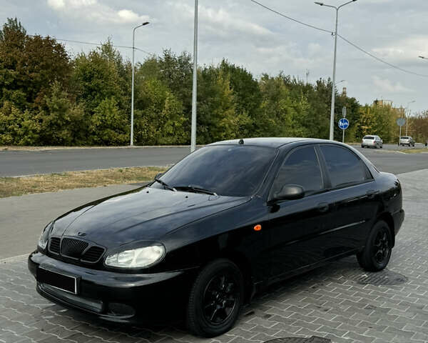 Черный Дэу Ланос, объемом двигателя 1.5 л и пробегом 185 тыс. км за 2400 $, фото 1 на Automoto.ua