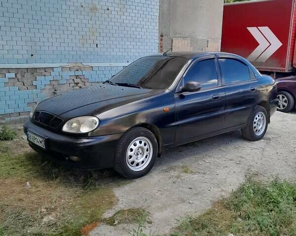Чорний Деу Ланос, об'ємом двигуна 1.5 л та пробігом 371 тис. км за 2100 $, фото 1 на Automoto.ua