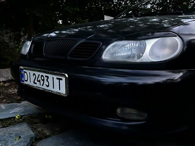 Черный Дэу Ланос, объемом двигателя 1.5 л и пробегом 274 тыс. км за 2000 $, фото 1 на Automoto.ua