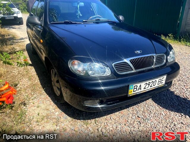 Черный Дэу Ланос, объемом двигателя 1.5 л и пробегом 200 тыс. км за 2000 $, фото 1 на Automoto.ua