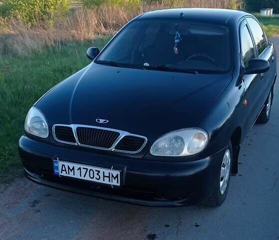 Черный Дэу Ланос, объемом двигателя 1.5 л и пробегом 248 тыс. км за 1800 $, фото 1 на Automoto.ua