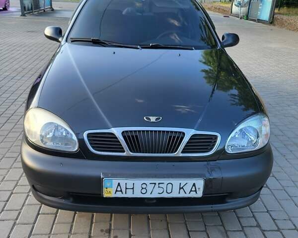 Черный Дэу Ланос, объемом двигателя 1.5 л и пробегом 215 тыс. км за 2900 $, фото 1 на Automoto.ua