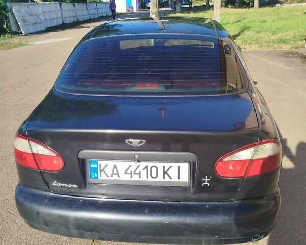 Черный Дэу Ланос, объемом двигателя 1.5 л и пробегом 284 тыс. км за 1800 $, фото 1 на Automoto.ua