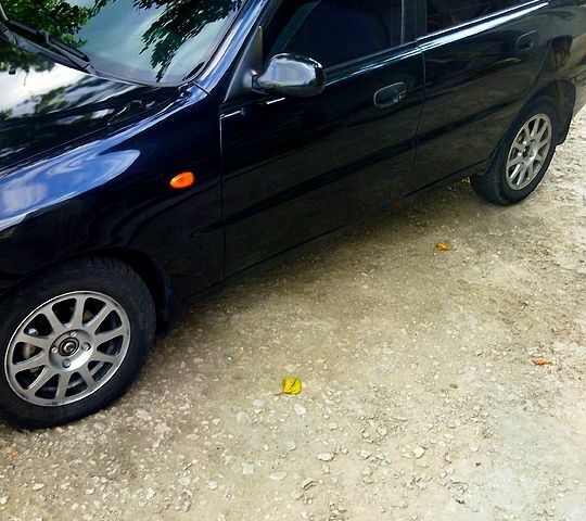 Черный Дэу Ланос, объемом двигателя 1.5 л и пробегом 187 тыс. км за 2600 $, фото 1 на Automoto.ua