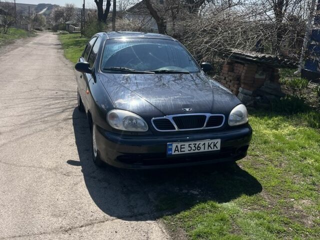 Черный Дэу Ланос, объемом двигателя 1.5 л и пробегом 324 тыс. км за 2599 $, фото 1 на Automoto.ua
