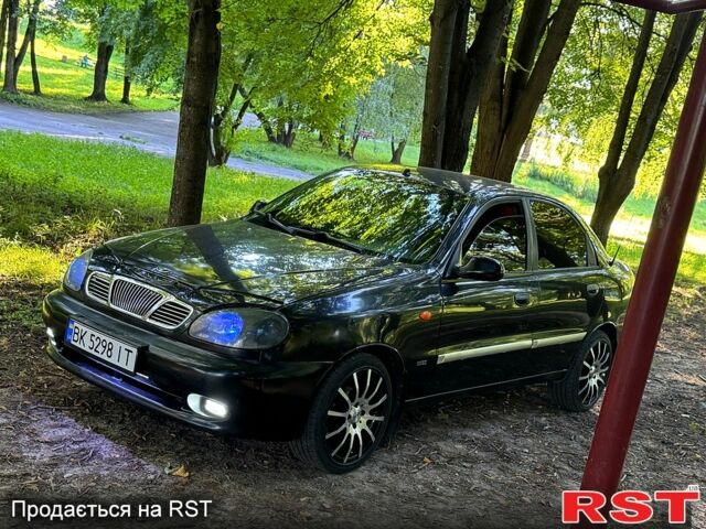 Черный Дэу Ланос, объемом двигателя 1.5 л и пробегом 0 тыс. км за 2000 $, фото 1 на Automoto.ua