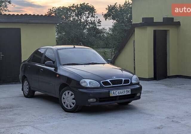 Черный Дэу Ланос, объемом двигателя 1.3 л и пробегом 150 тыс. км за 1400 $, фото 1 на Automoto.ua