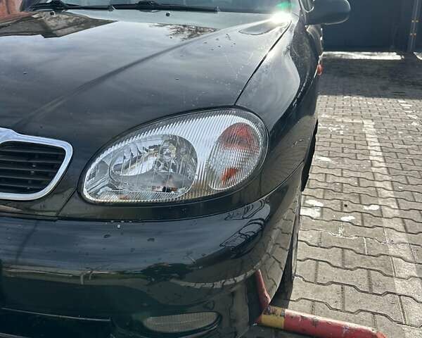 Чорний Деу Ланос, об'ємом двигуна 1.5 л та пробігом 230 тис. км за 3000 $, фото 1 на Automoto.ua