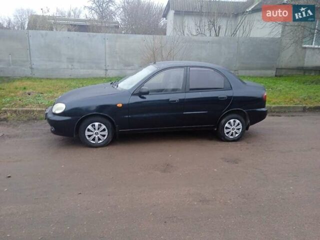 Черный Дэу Ланос, объемом двигателя 1.5 л и пробегом 230 тыс. км за 2350 $, фото 1 на Automoto.ua