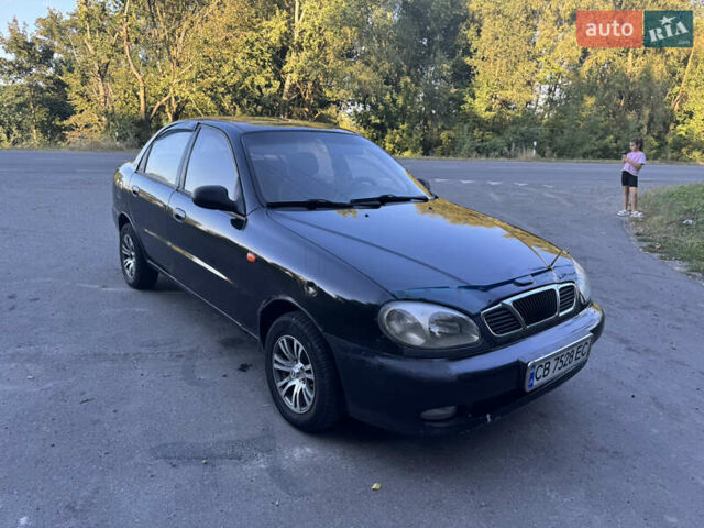 Чорний Деу Ланос, об'ємом двигуна 1.5 л та пробігом 200 тис. км за 1350 $, фото 1 на Automoto.ua