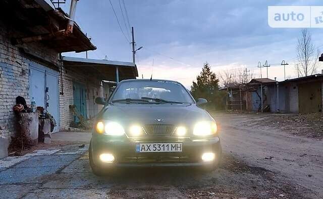 Черный Дэу Ланос, объемом двигателя 1.5 л и пробегом 239 тыс. км за 1900 $, фото 1 на Automoto.ua