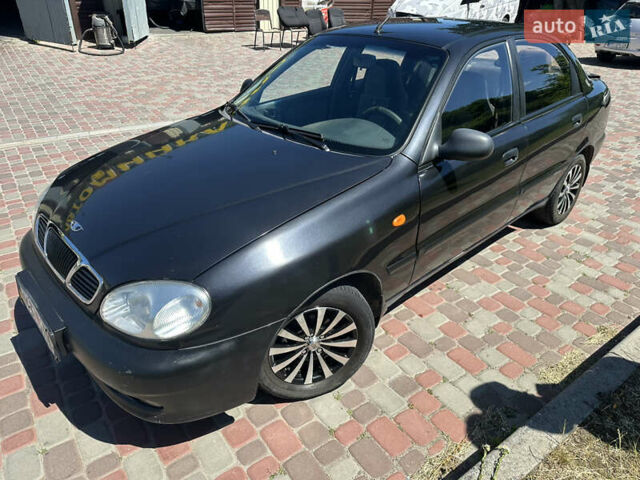 Черный Дэу Ланос, объемом двигателя 1.5 л и пробегом 111 тыс. км за 2890 $, фото 1 на Automoto.ua
