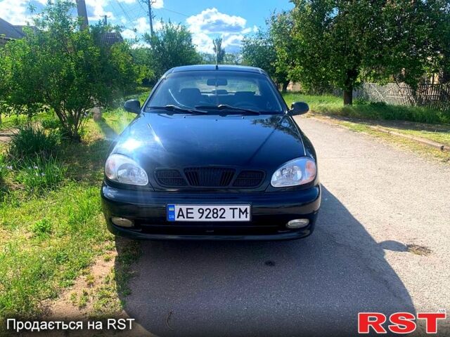 Черный Дэу Ланос, объемом двигателя 1.5 л и пробегом 255 тыс. км за 3200 $, фото 1 на Automoto.ua