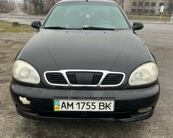 Черный Дэу Ланос, объемом двигателя 1.5 л и пробегом 201 тыс. км за 1000 $, фото 1 на Automoto.ua