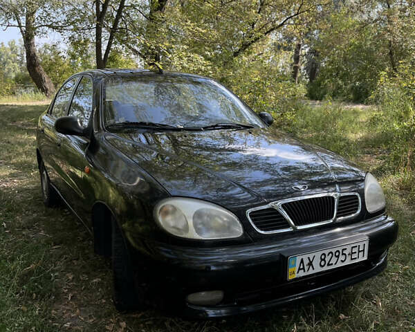 Черный Дэу Ланос, объемом двигателя 1.5 л и пробегом 140 тыс. км за 2905 $, фото 1 на Automoto.ua