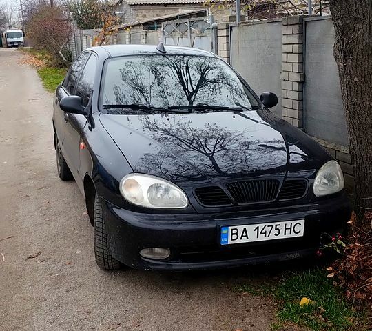 Чорний Деу Ланос, об'ємом двигуна 1.6 л та пробігом 140 тис. км за 2900 $, фото 1 на Automoto.ua