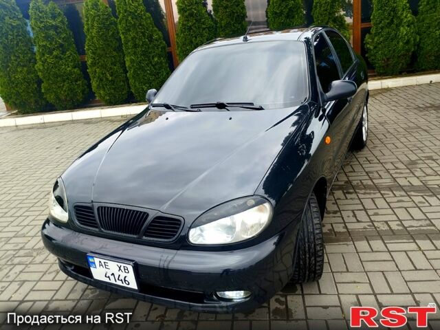 Черный Дэу Ланос, объемом двигателя 1.6 л и пробегом 249 тыс. км за 3500 $, фото 1 на Automoto.ua