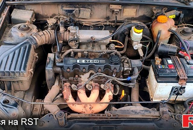 Черный Дэу Ланос, объемом двигателя 1.6 л и пробегом 200 тыс. км за 1700 $, фото 1 на Automoto.ua