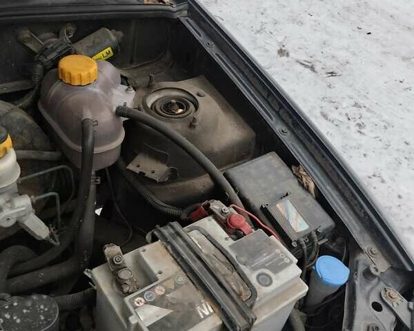 Черный Дэу Ланос, объемом двигателя 1.5 л и пробегом 145 тыс. км за 1200 $, фото 1 на Automoto.ua