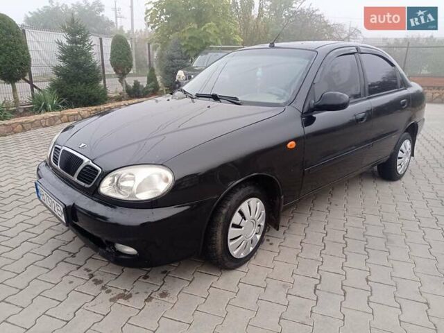 Чорний Деу Ланос, об'ємом двигуна 1.5 л та пробігом 220 тис. км за 2200 $, фото 1 на Automoto.ua