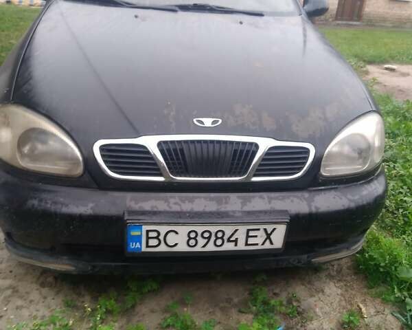 Черный Дэу Ланос, объемом двигателя 1.5 л и пробегом 235 тыс. км за 1300 $, фото 1 на Automoto.ua