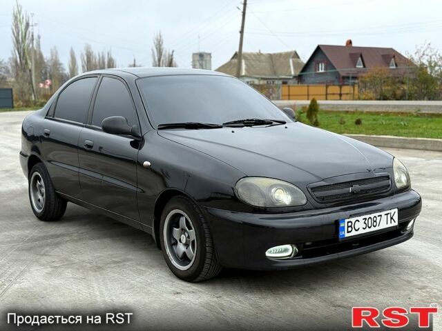 Чорний Деу Ланос, об'ємом двигуна 1.5 л та пробігом 240 тис. км за 2750 $, фото 1 на Automoto.ua