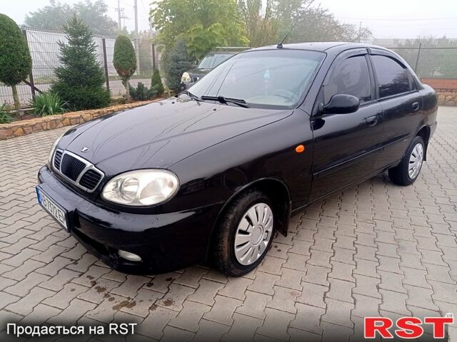 Чорний Деу Ланос, об'ємом двигуна 1.5 л та пробігом 0 тис. км за 2300 $, фото 1 на Automoto.ua