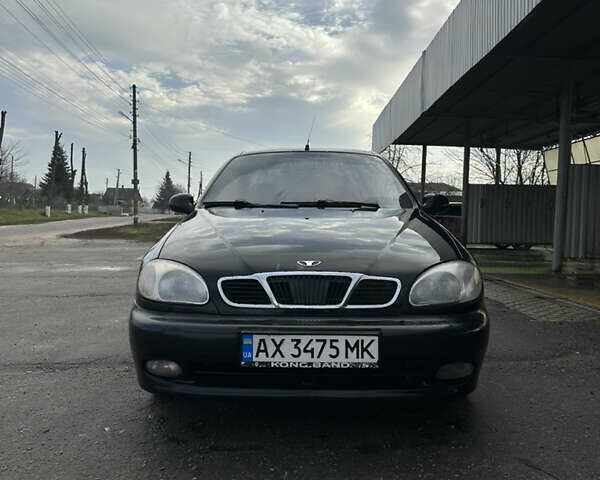 Чорний Деу Ланос, об'ємом двигуна 1.5 л та пробігом 150 тис. км за 1700 $, фото 1 на Automoto.ua