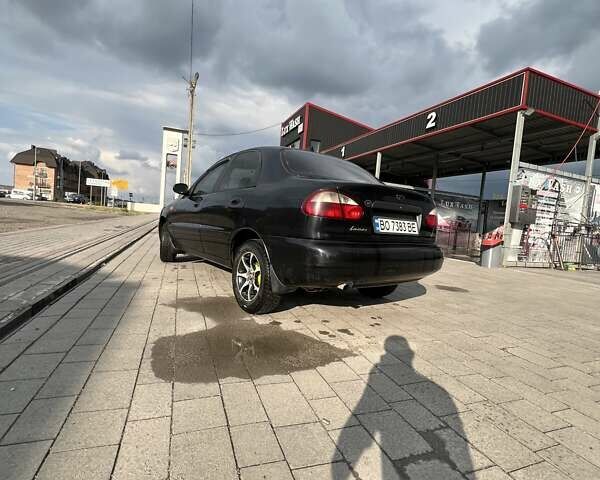 Деу Ланос 2007 у Тернополі на Automoto.ua Чорний Деу Ланос, об'ємом двигуна 1.5 л та пробігом 219 тис. км за 2100 $, фото 1 на Automoto.ua