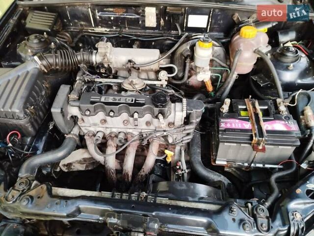 Черный Дэу Ланос, объемом двигателя 1.5 л и пробегом 270 тыс. км за 2850 $, фото 1 на Automoto.ua