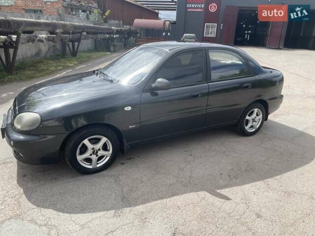 Черный Дэу Ланос, объемом двигателя 1.5 л и пробегом 270 тыс. км за 2000 $, фото 1 на Automoto.ua