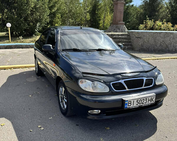 Черный Дэу Ланос, объемом двигателя 1.5 л и пробегом 175 тыс. км за 2800 $, фото 1 на Automoto.ua