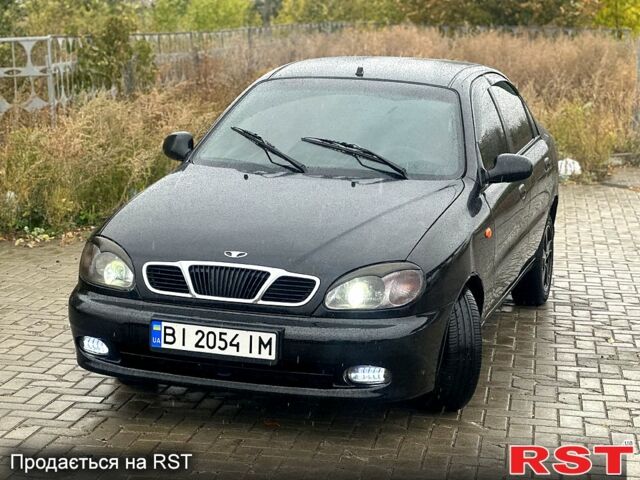 Чорний Деу Ланос, об'ємом двигуна 1.5 л та пробігом 290 тис. км за 2850 $, фото 1 на Automoto.ua