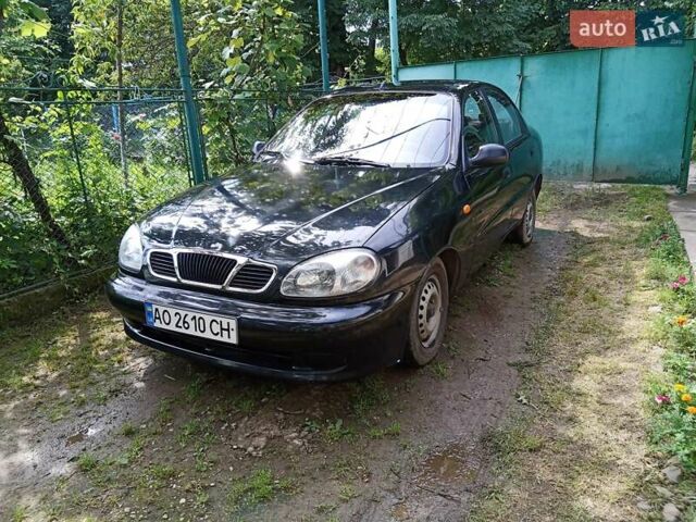 Черный Дэу Ланос, объемом двигателя 1.5 л и пробегом 158 тыс. км за 1800 $, фото 1 на Automoto.ua